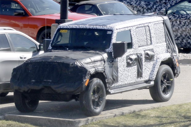 Previous spy photographs suggest Jeep is working on a new version of its three-piece hardtop. Photo: Brian Williams