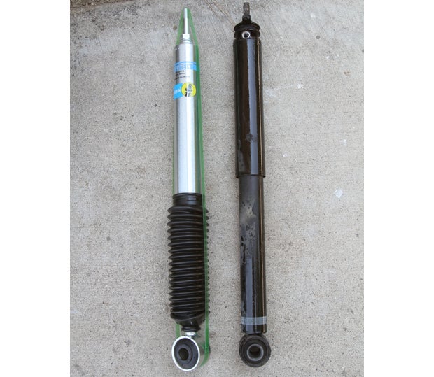 Heres a comparison of the stock unit and the Bilstein 5100. The rubber suspension bushing is the only part well remove and reuse from the OE shock, though if yours is worn youll want to replace this piece. 