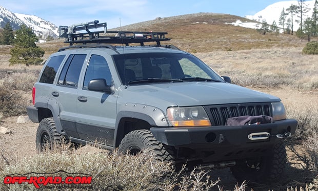 The Smittybilt Defender rack offers a great option for storing gear on the trail.